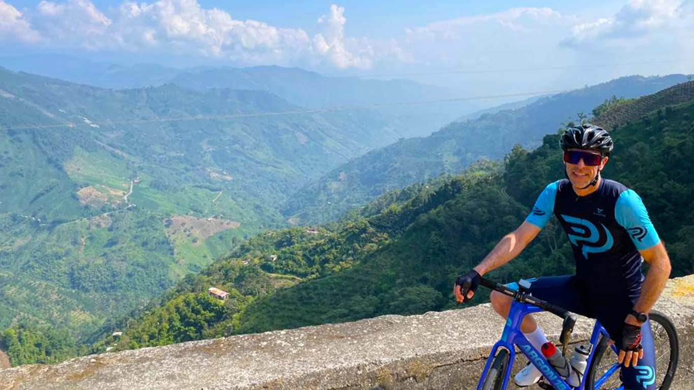 happy cyclist on a bicycle tour in colombia
